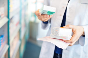 CVS Pharmacy person getting prescription filled